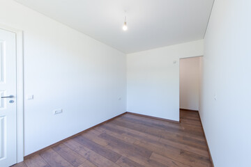 Modern Empty Room With Wooden Floor and White Walls