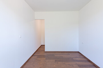 Modern Empty Room With Wooden Floor and White Walls