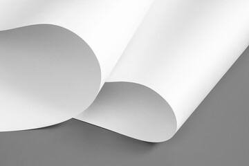 Sheets of white paper in black and white.