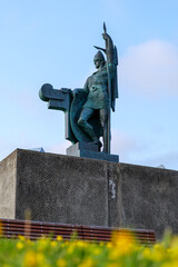 Bronze Sculpture of Ing&oacute;lfur Arnarson with Odin Yggdrasil and Dragon at Arnarh&oacute;ll in Reykjavik Iceland