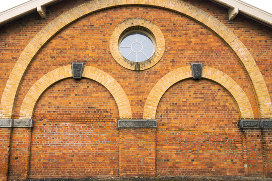 Curved brickwork and arches on a building