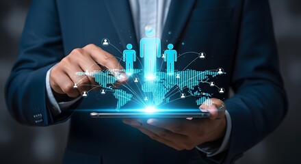 Businessman using a tablet displaying a global network of people, highlighting digital connectivity and global reach.