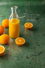 Freshly Squeezed Orange Juice on Rustic Table