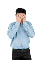 Frustrated young Asian man covering face with hands, stress and emotional pressure concept, isolated on white background