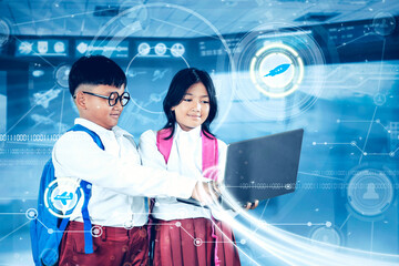 Indonesian Schoolchildren Using Laptop with Futuristic Digital Interface Overlay