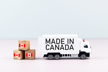 Truck and boxes with the inscription made in Canada.