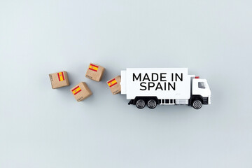 Truck and boxes with the inscription made in Spain.