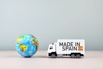 Truck and boxes with the inscription made in Spain.