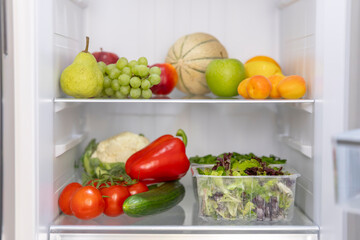 Fresh Fruits and Vegetables in a Refrigerator