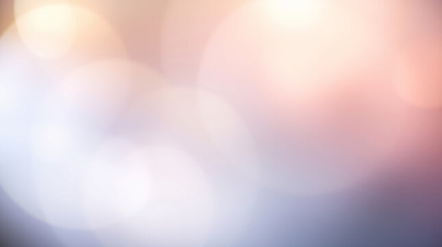 Abstract bokeh background with soft blur and gentle glowing light effects.