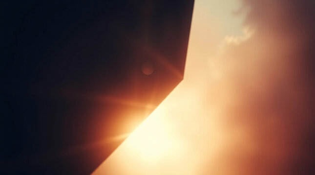 Abstract gradient texture with warm tones and a soft glowing light effect.