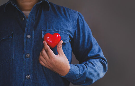 Hand holding red heart, World health day, Health care and mental health concept, Health insurance, Charity volunteer donation, CSR responsibility, World heart day, Self love