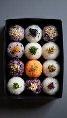 Delicious onigiri rice balls assortment in a box perfect for japanese food catering