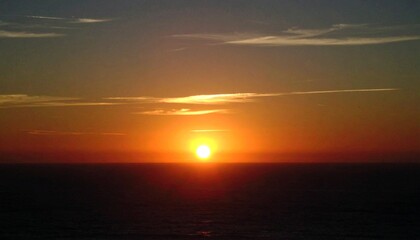 Naklejka premium Sunset over the Ocean