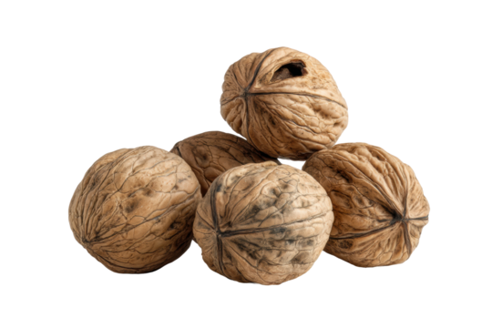 PNG Pile of raw walnuts isolated on black background