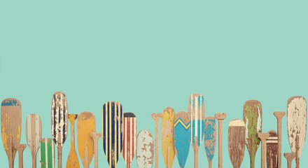 Colorful Wooden Paddles on Turquoise Background &ndash; Nautical Vintage Concept

