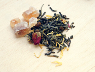 Green tea with herbs, dry rose bud and brown sugar