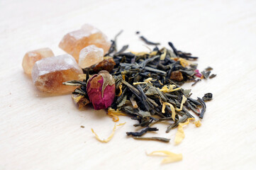 Green tea with herbs, dry rose bud and brown sugar