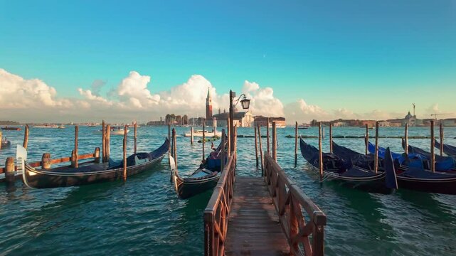 San Giorgio Maggiore church and traditional Venetian gondolas in Venice, Italy