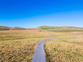 Italy 03 July 2025: aerial view from the drone of the Campo Imperatore plateau in the province of...