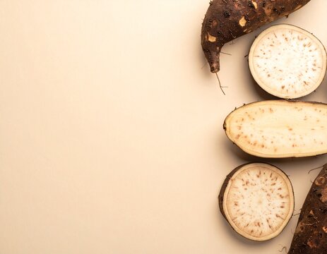 Sliced Elephant Foot Yam on Earthy Background &ndash; Minimal Top-Down Food Visual