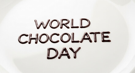 Fototapeta premium World Chocolate Day message made with real chocolate on a white plate