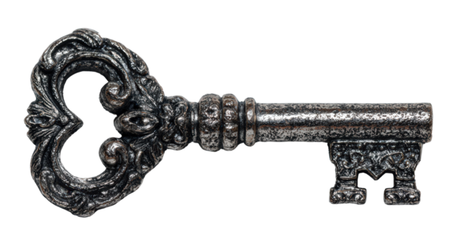 Vintage Ornate Silver Key with Intricate Design and Heart Shape