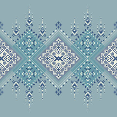 A highly detailed tribal design featuring fine diamond patterns and ornamental extensions in blue and grey shades.