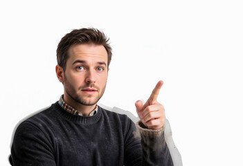 A man points to a blank screen or wall, emphasizing the need for data, solutions, or a clear statement.