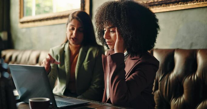 Business, people or stress with laptop in restaurant for story error, article criticism or issue. Remote work, journalist or frustrated in cafe for submission fail, editor rejection email or teamwork