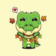 Cute crocodile holding autumn leaf decoration in autumn day cartoon vector illustration