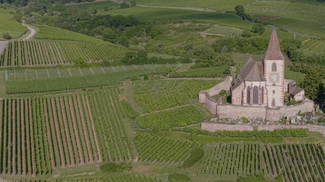 Hunawihr, France - Aerial view of Alsacian village and vineyards and sunrise