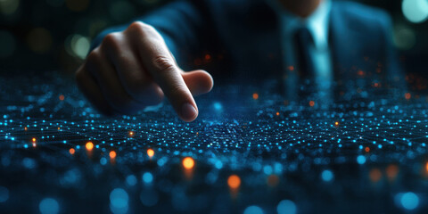 Man is pointing at computer screen on blue background