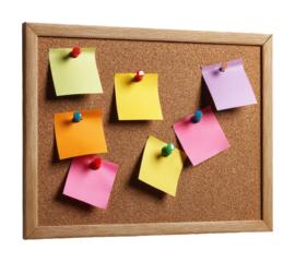 Organizing ideas with colorful sticky notes on corkboard office