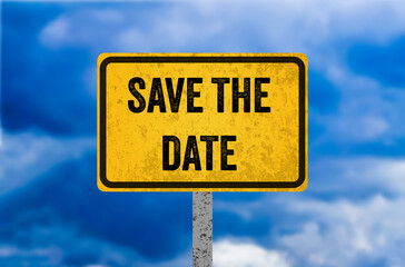 Save the date message written on yellow metal sign. Conceptual save the date symbol. Copy space.