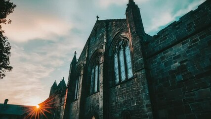 Sunlit stone church facade at sunset, Gothic architecture - Powered by Adobe