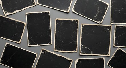 Collection of Vintage Black and White Photo Prints with Scratches and Tears