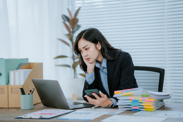 Upset asian businesswoman in office struggles with frustration, stress, worries over failure and...