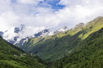 Naklejka premium mountain landscape with clouds