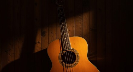 Fototapeta premium Acoustic Guitar Leaning Against Wooden Wall, Dramatic Lighting, Warm Tones.