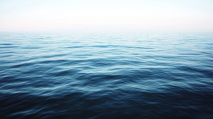 Obraz premium Calm ocean water, misty sky, background, serenity