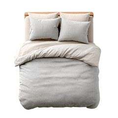 Obraz premium A neatly made bed with four pillows and a textured, light-colored comforter and sheet set.