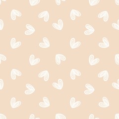 seamless pattern with hand-drawn hearts on beige background 