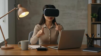 Asian Woman in VR Headset Interacting with Virtual Reality at Home Office - Powered by Adobe