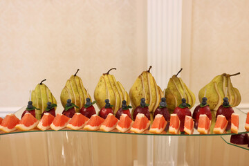 Beautiful sweet buffet with fruits and berries. Fruit table.