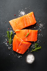 Raw salmon fillet with spices.