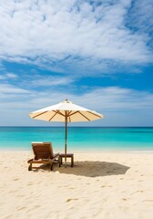 Tropical Beach with Lounge Chairs and Umbrella on White Sand with Clear Blue Sea