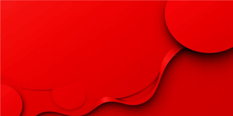 Red paper background with a luxurious red satin ribbon and festive gold holiday decoration for your celebration card design