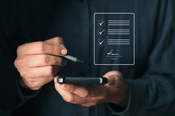 Person using a smartphone and stylus to complete an online form with checkboxes and digital...