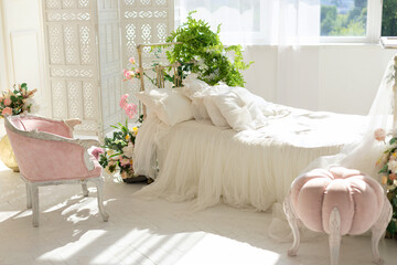 luxury delicate vintage white bedroom with metal bed and pillows and linen in classic style. Shabby chic interior girly or provencal style with pink pouffe. Wedding interior room. Princess design room © stock_studio
